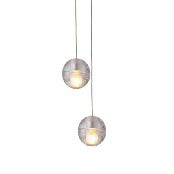 A handmade cluster LED pendant light with two spherical glass globes suspended from a ceiling mount by metal frames.