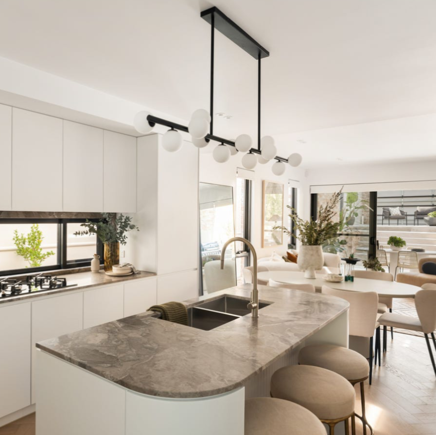 Blossom Slim 14 Light Linear 150cm Pendant in Brushed Brass or Black