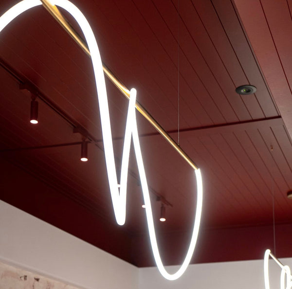 Curl Curl Large Adjustable 200cm Linear Suspension Pendant in Brushed Brass