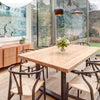 Replica tom dixon in Australian cafe with natural wooden furniture 