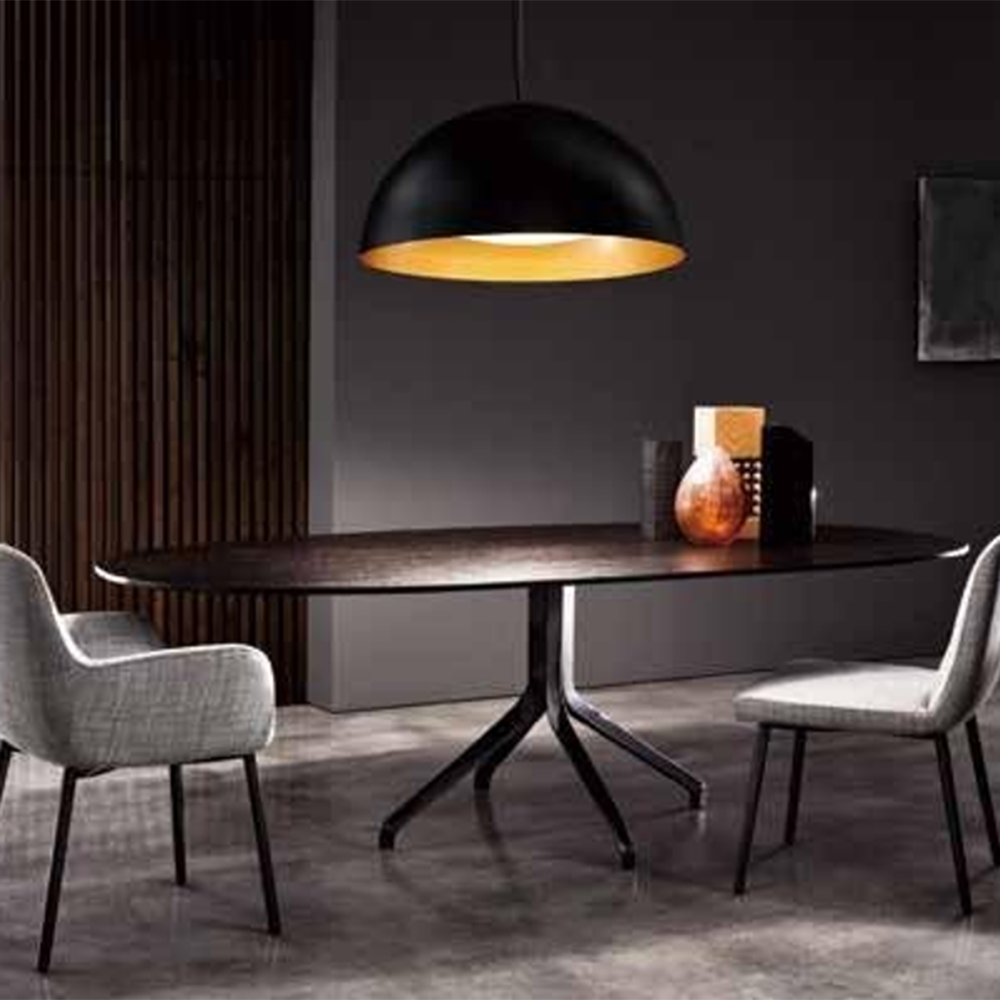 large dome shaped black pendant over dining table with grey fabric chairs ultra modern interior lighting 2020