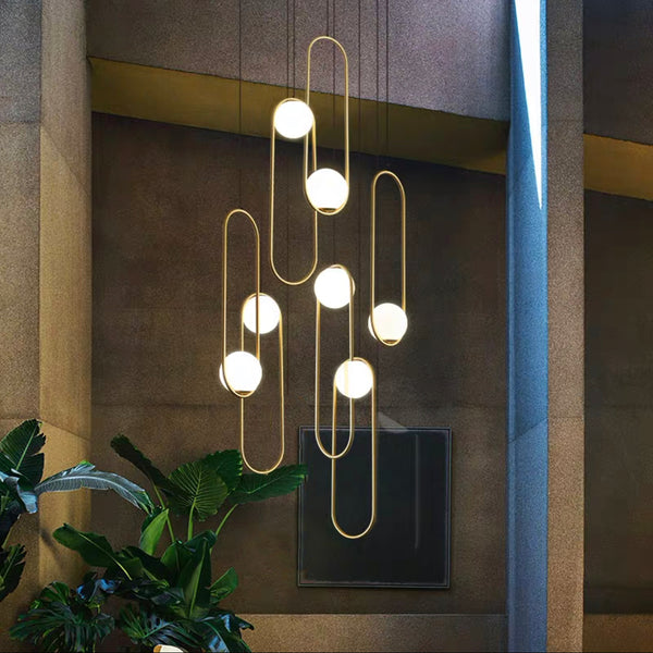 Loretta 7 Light Modern Minimalist Chandelier in Brushed Brass