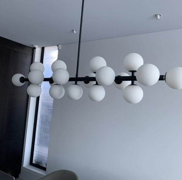 high quality pendant lights australia black 19 light dimmable modern contemporary white glass opal suspended over a wonderful dining table 